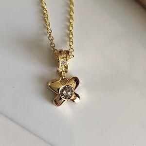 Gold Star Pendant Necklace with CZ Accents